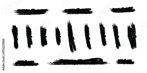 A collection of black brush strokes on a white background for artistic reference