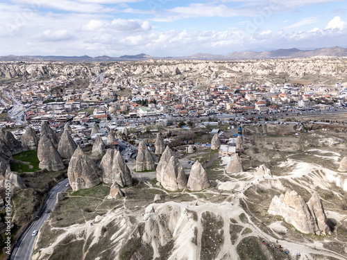 Cappadocia valley landscape with fairy chimney rock formations and Goreme village
