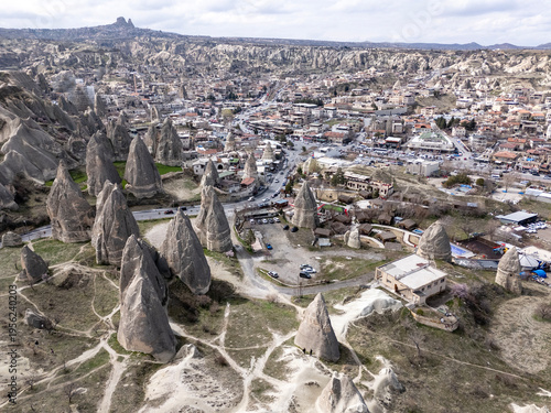 Cappadocia valley landscape with fairy chimney rock formations and Goreme village