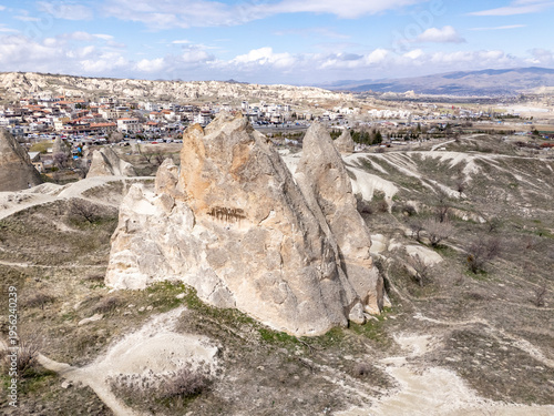 Cappadocia valley landscape with fairy chimney rock formations and Goreme village