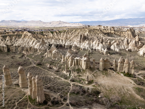 Cappadocia fairy chimneys rock formations in Love valley, Nevsehir, Turkiye