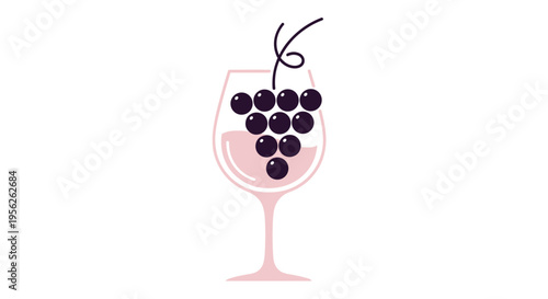Stylish wine glass filled with rose wine and a bunch of dark grapes inside it creates a sophisticated icon for wine and viticulture.