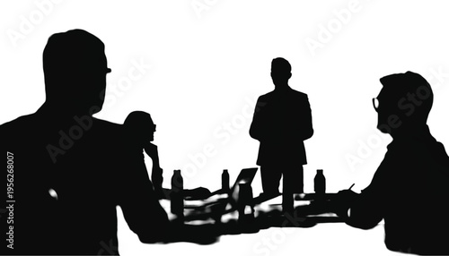 Silhouettes of executives conducting a serious negotiation or presentation around a table with small objects.