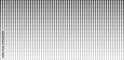 Black dots on white background creating an abstract halftone pattern with gradual fade effect