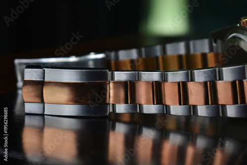 Luxury watches placed on a glittering glass floor