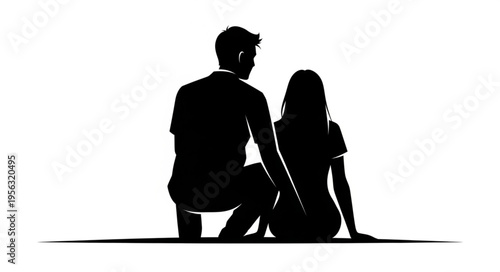 Silhouette of a couple sitting together, sharing a quiet moment.