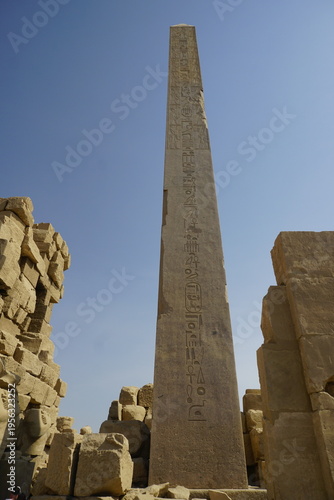 Photography Ancient Egyptian Granite Obelisk at Karnak Temple Complex under Clear Blue Sky,