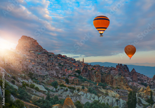 Hot air balloon flying over spectacular Cappadocia - Goreme, Turkey