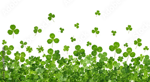 Lucky green shamrocks floating in air on transparent background