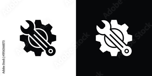 Black and white gear with wrenches symbol