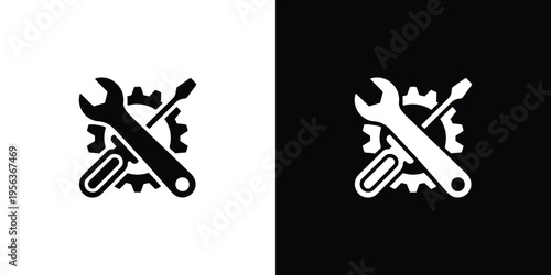 Black and white of screwdriver and wrench on gear tools
