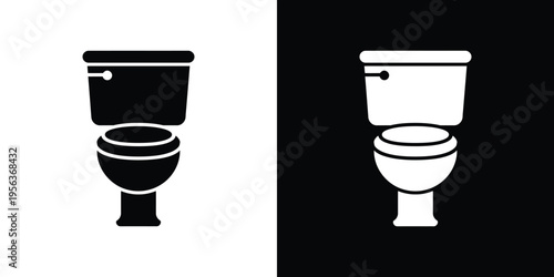 Black and white toilet side by side bathroom plumbing