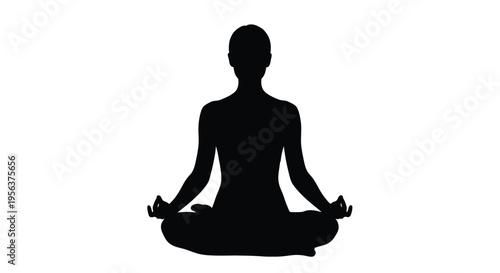 Silhouette of a person meditating in the lotus position