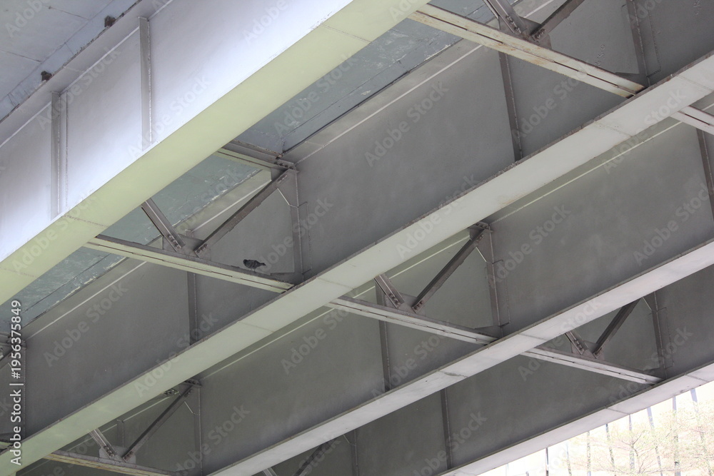Fototapeta premium Industrial Ceiling with Ventilation Panels and Metal Grid Structure