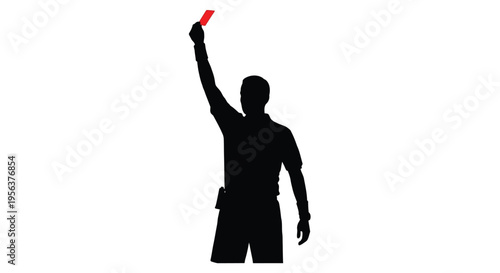 Silhouette of a referee displaying a red card during a game