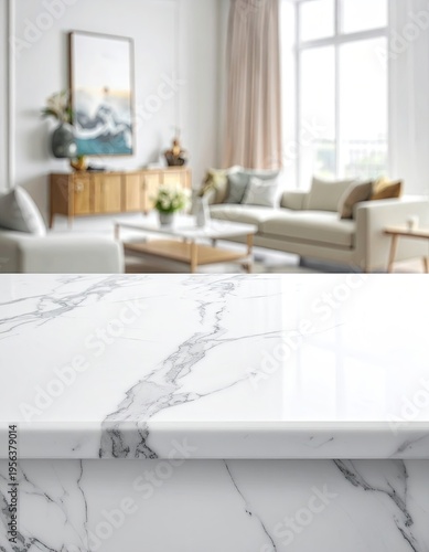 White marble countertop in focus, leading to a blurred modern living room