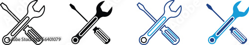 A set of four crossed wrenches in different colors and styles