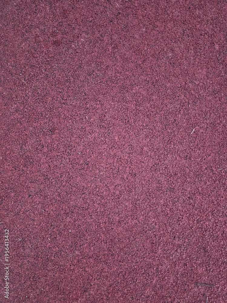 Fototapeta premium close up texture of red rubber running track surface used for athletics and outdoor sports field