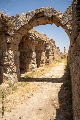 Stone arch over a Roman road in Bulla Regia, outside of Jendouba, Tunisia