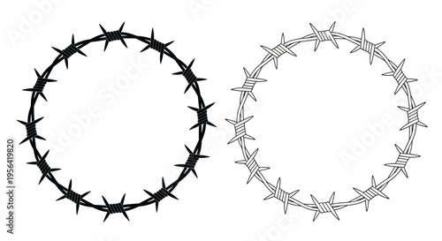 Two circular frames constructed from black and white barbed wire