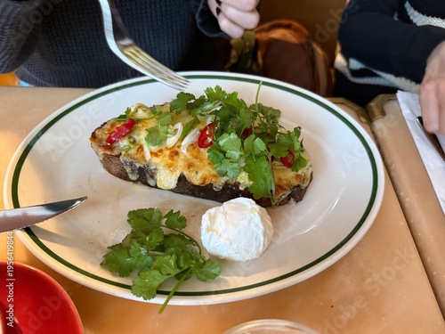 Rarebit Welsh Rarebit open sandwich crostini served at restaurant