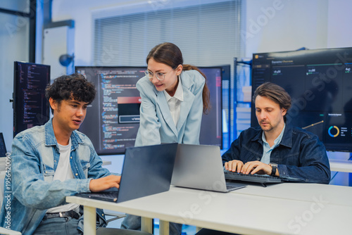 Картината върху платно collaborative AI development team in modern tech office: young male developer co