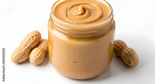 Creamy Peanut Butter Jar with Peanuts on White Background.