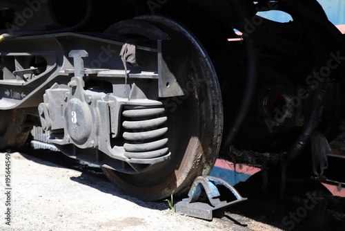 Close-Up of Train Wheel and Suspension System, Steel Bogie with Brake Components