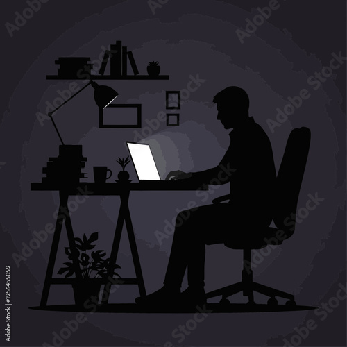 remote worker on computer in home office at night