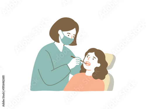 Dentist examining patient in clinic