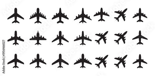 Numerous airplanes arranged in rows on white background for travel concepts
