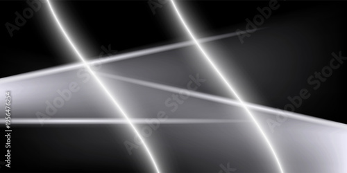 Abstract light streaks on a dark backdrop creating a dynamic, energetic mood.