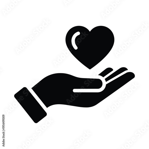 Hand holding heart symbol representing care and compassion