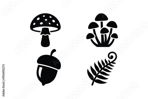 Forest nature icon set with mushrooms acorn and fern - Black silhouette woodland flora elements isolated on white