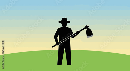 Silhouette of a diligent farmer standing with hoe in a serene rural landscape with a gradient sky