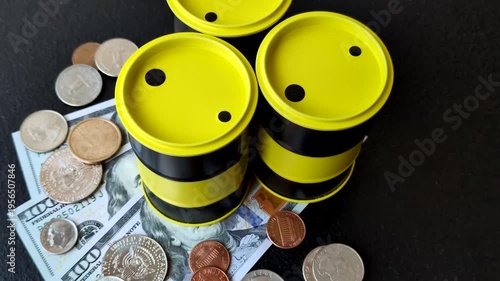 A barrel of oil against a backdrop of dollars as a concept for the global oil crisis and rising prices. A barrel of oil and dollars as a background for your design