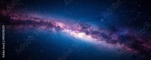 Panoramic view of the Milky Way galaxy, its radiant core and purple-pink dust lanes arcing diagonally across the deep blue, star-filled cosmic night. Infinite universe. ,Astronomy