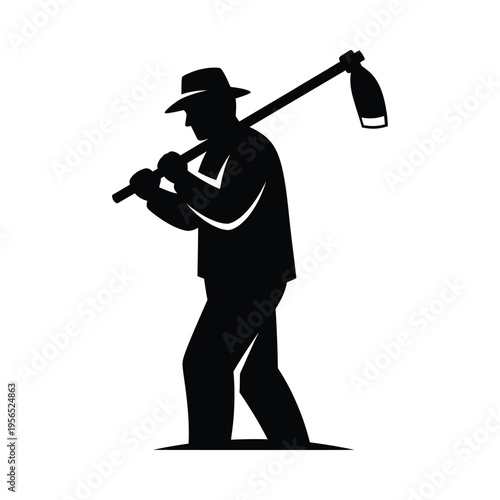 Silhouette of a man carrying an axe and lantern, walking in a mysterious, dark atmosphere