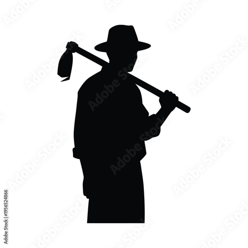 Silhouette of a man with a hat and a pickaxe over his shoulder, evoking a sense of labor and determination