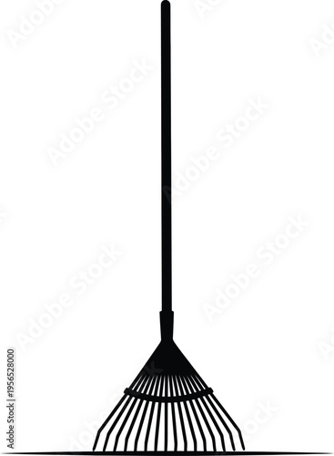 A black silhouette of a garden rake