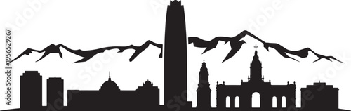 Iconic city skyline with high rise tower set against majestic Andean mountain range