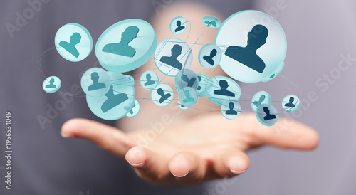 Hand holding a network of p...