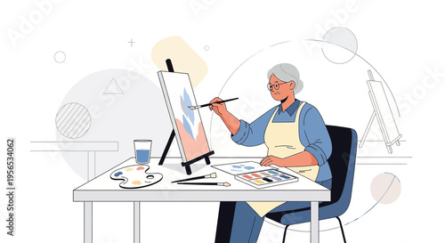 Senior woman pursuing artistic passion by painting on canvas in creative studio setting