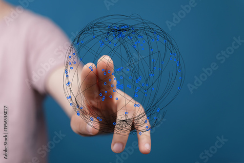 Hand touching a digital glo...