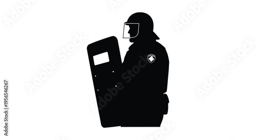 Riot police officer with shield a stark black silhouette