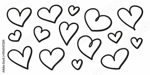 Collection of hand drawn hearts in black and white scattered randomly