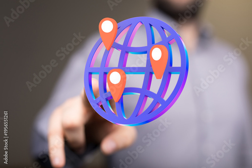 Hand pointing at a globe wi...