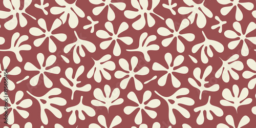 Abstract pattern displays organic shapes and leaf like floral elements on a dark red background