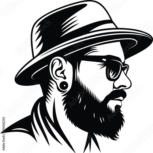 Bearded hipster with glasses and a hat looks off to the right side