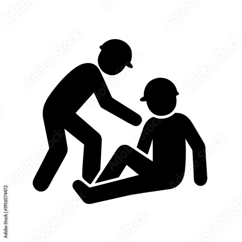 Two workers one helping the other sitting on the ground